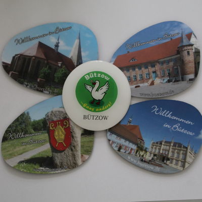 Untersetzer mit diversen Motiven: Wappen, Logo, Rathaus, Stiftskirche, Krummes Haus
